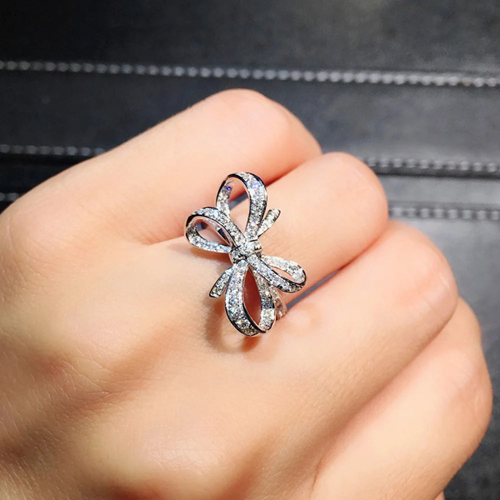 Huitan Bow Shape Cubic Zirconia Wedding Band Ring for Women Anniversary Jewelry